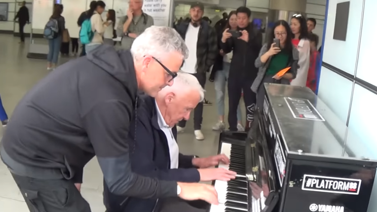 Senior man plays piano and gets a secret visit from boogie-woogie master